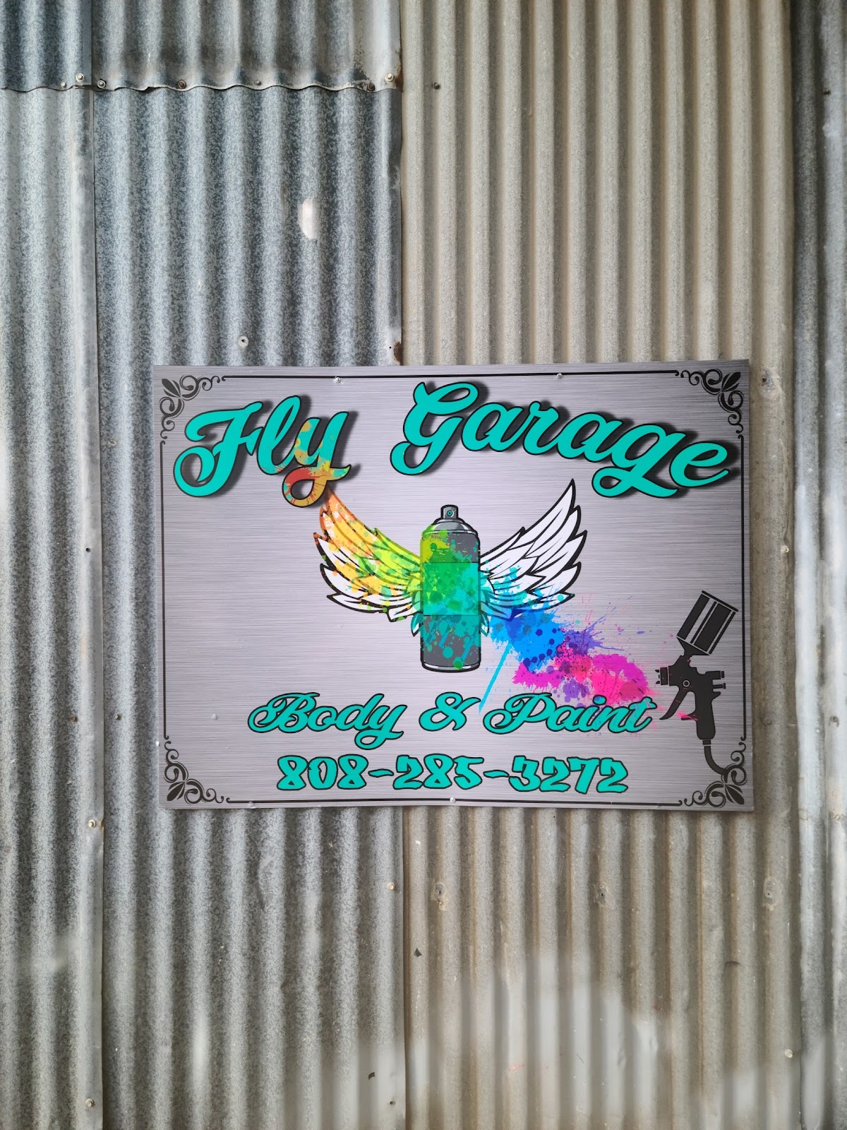 Fly Garage shop and vehicle holding visual